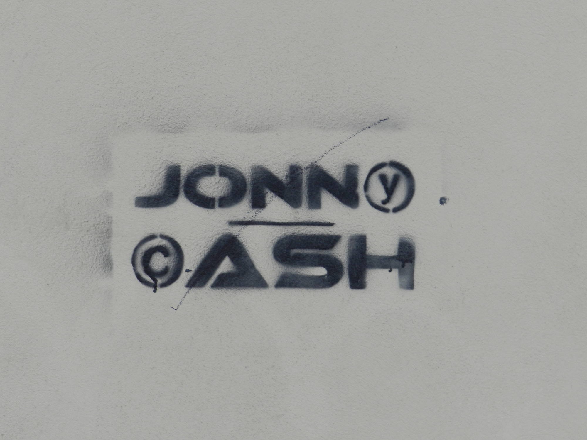 Detailaufnahme der Johnny Cash Spray Aufschrift